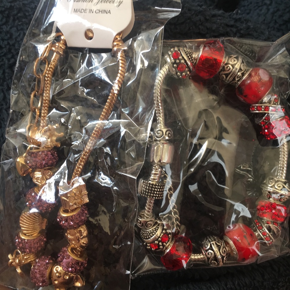 Two charm bracelets